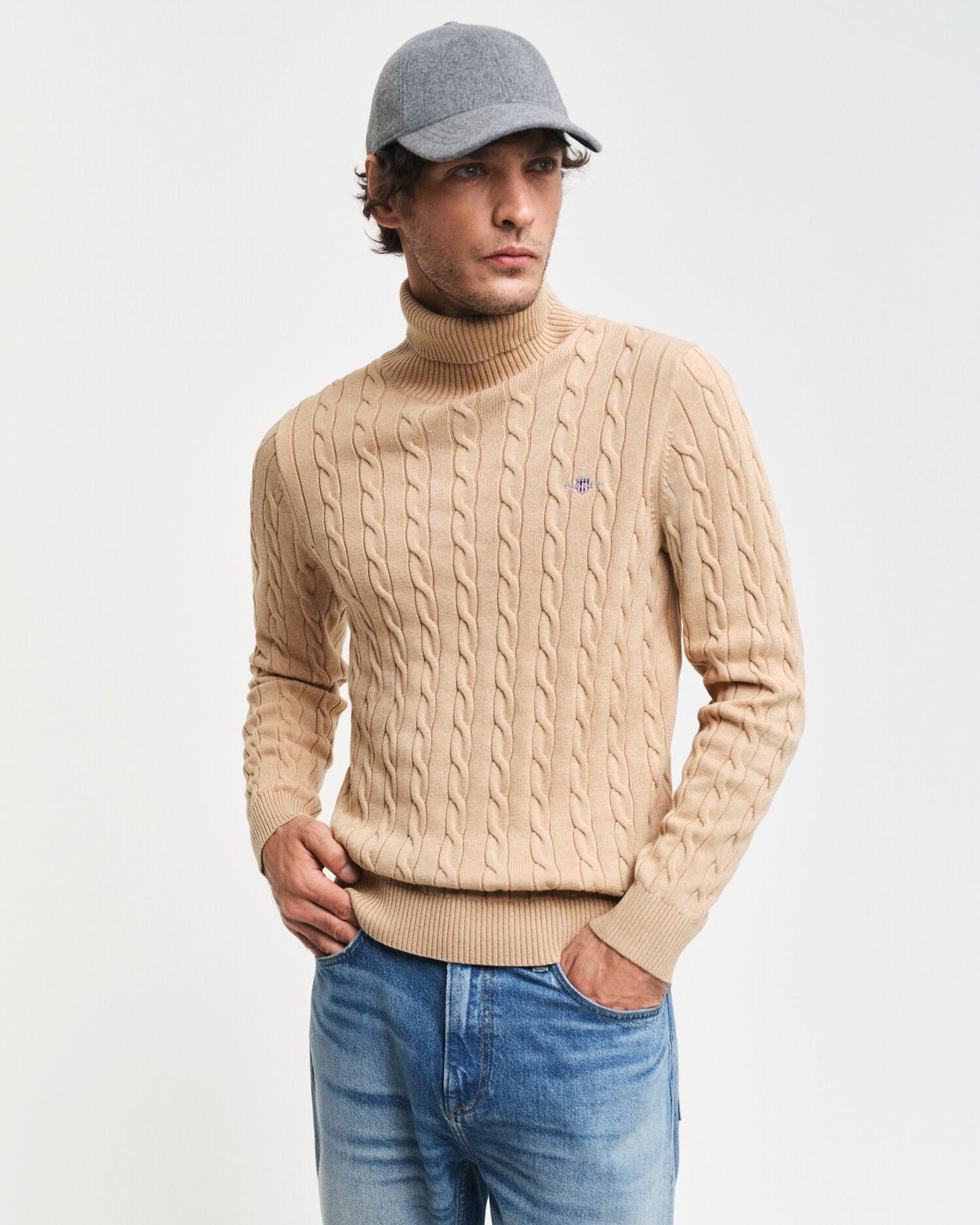 Pull col roulé en maille torsadée de coton