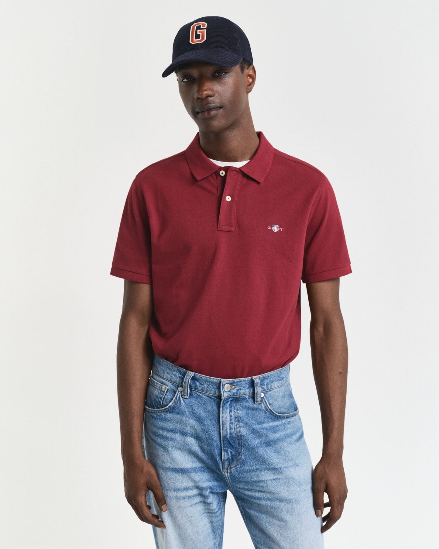 Polo piqué à écusson coupe droite
